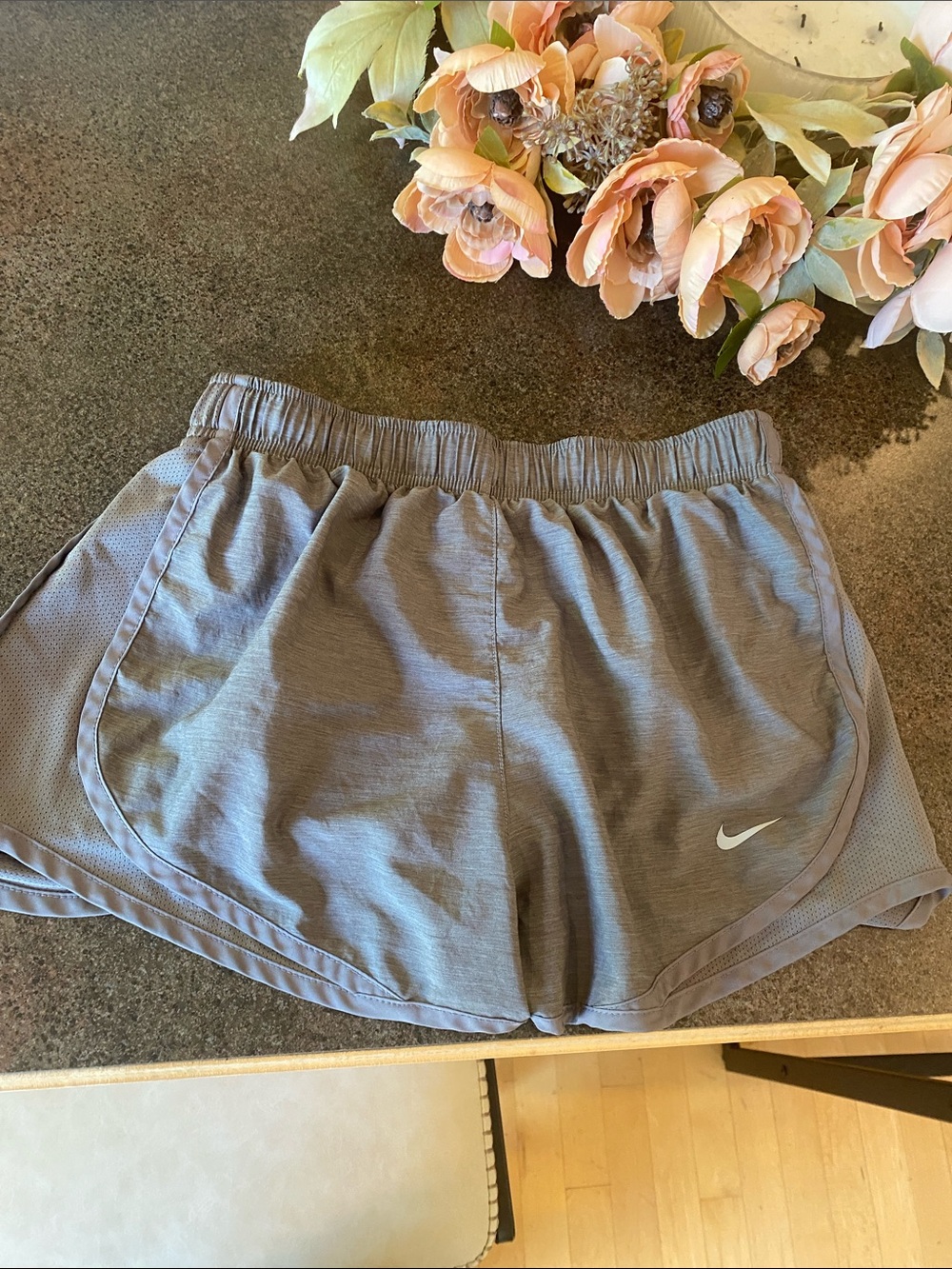 Nike Women's Light Gray Athletic Running Shorts with White Swoosh